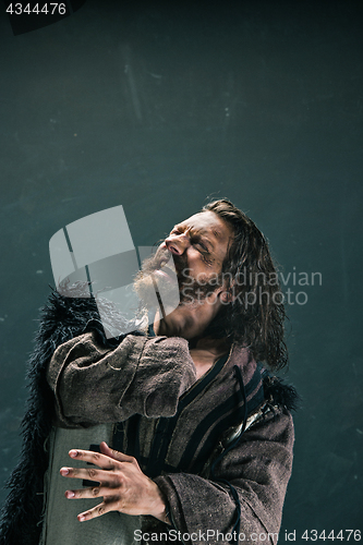 Image of Actor in makeup, a poor man