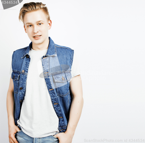 Image of young handsome teenage hipster guy posing emotional, happy smiling against white background isolated, lifestyle people concept