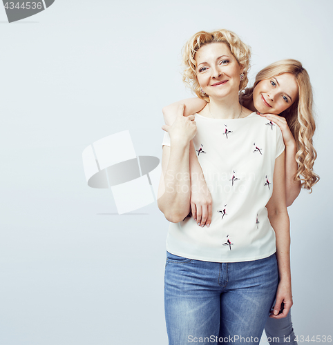 Image of mother with daughter together posing happy smiling isolated on white background with copyspace, lifestyle people concept 