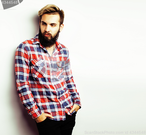 Image of portrait of young bearded hipster guy on gray dark background close up, brutal modern man, lifestyle people concept 