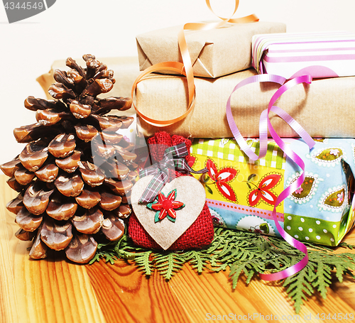 Image of lot of stuff for handmade gifts, scissors, ribbon, paper with countryside pattern, ready for holiday concept, nobody home 