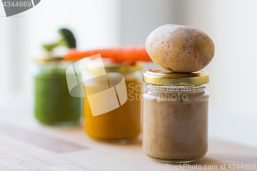 Image of vegetable puree or baby food in glass jars