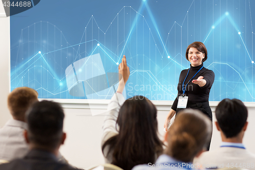 Image of group of people at business conference or lecture