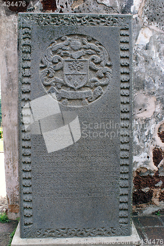 Image of Grave stone and wall