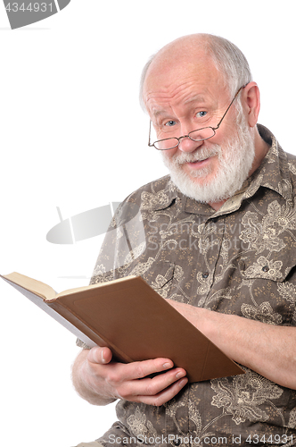 Image of Senior man reading a book, isolated on white