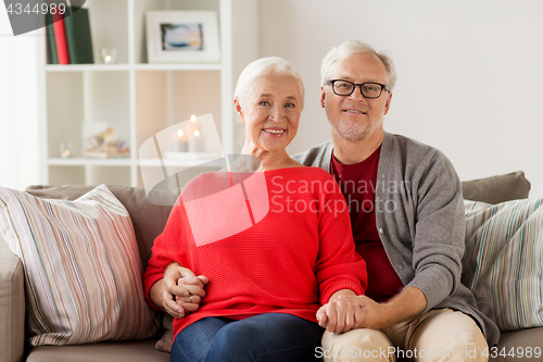 Image of happy smiling senior couple at christmas