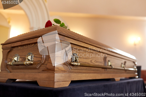 Image of coffin at funeral in church