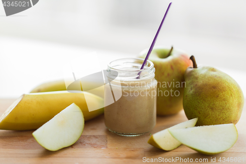 Image of jar with fruit puree or baby food