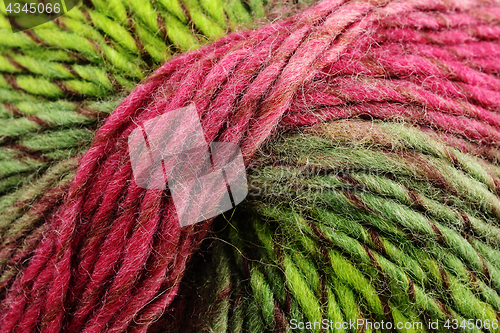 Image of coil of colorful wool, red and green 