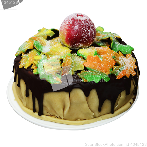 Image of autumn cake with maple leaves and apple