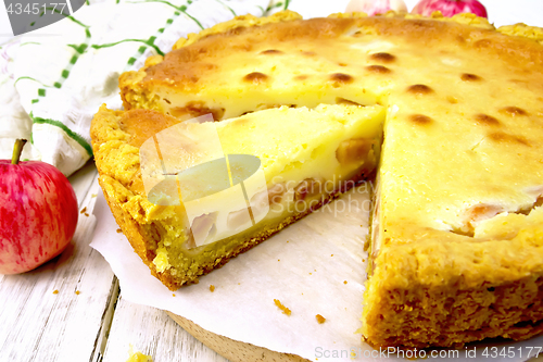 Image of Pie apple with sour cream on parchment