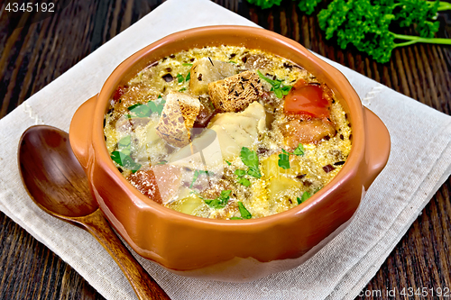 Image of Soup fish with vegetables and cream on board