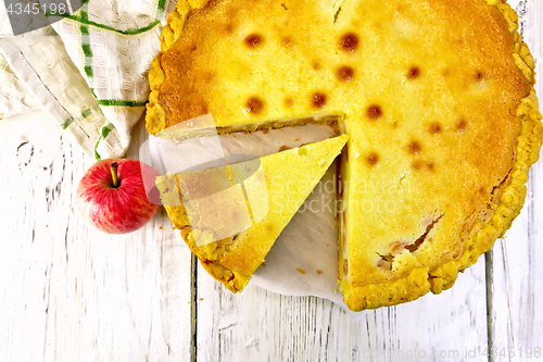 Image of Pie apple with sour cream on light board top