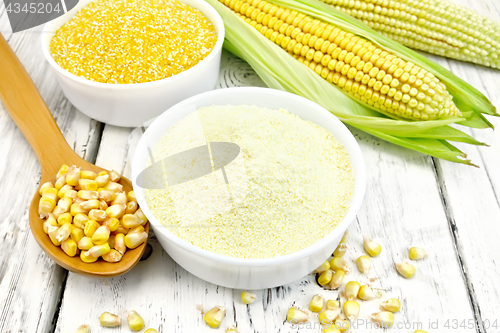 Image of Flour and grits corn in bowls on board