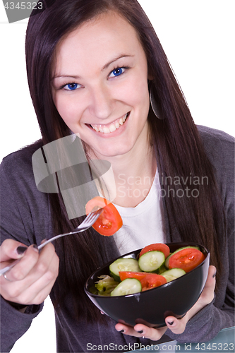 Image of Beautiful Girl Eating Salad