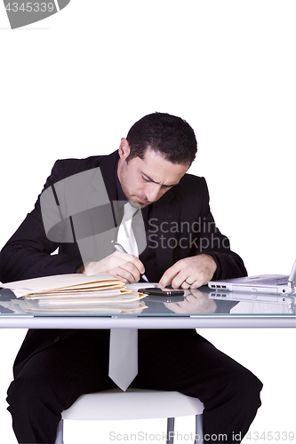 Image of Businessman at His Desk Working