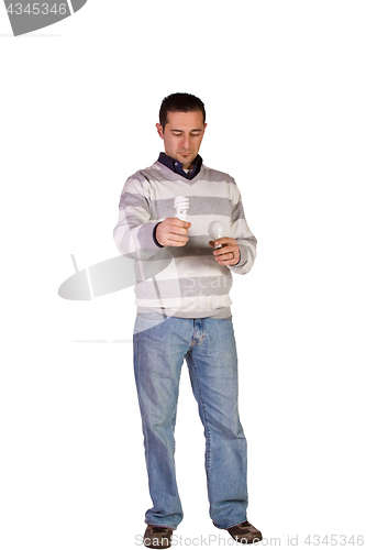 Image of Casual Man Choosing Green Friendly Bulb