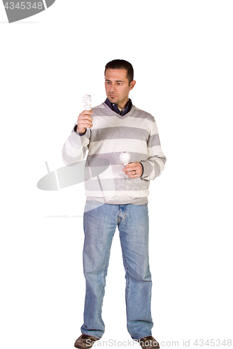 Image of Casual Man Choosing Green Friendly Bulb