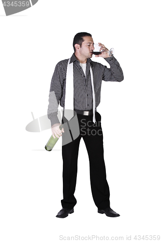 Image of Businessman celebrating with a glass of drink 