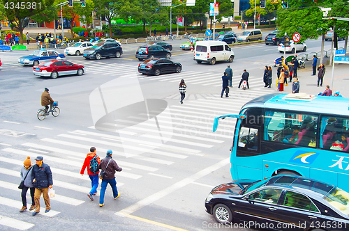 Image of People crossing the road. Shanghai