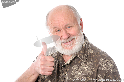 Image of Senior man shows thumbs up gesture, isolated on white