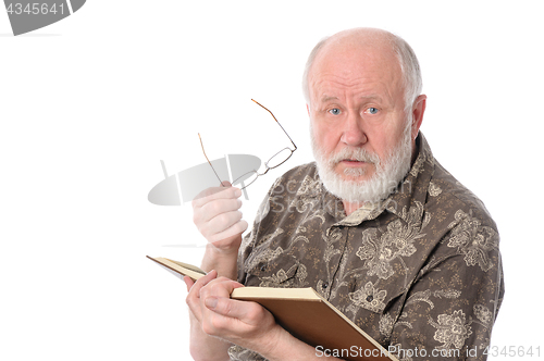 Image of Senior man reading a book, isolated on white