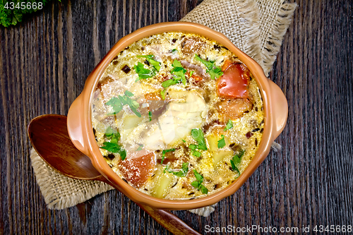 Image of Soup fish with vegetables and cream on board top