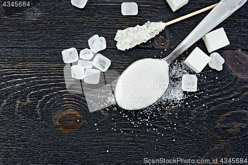 Image of Sugar white in spoon on board top