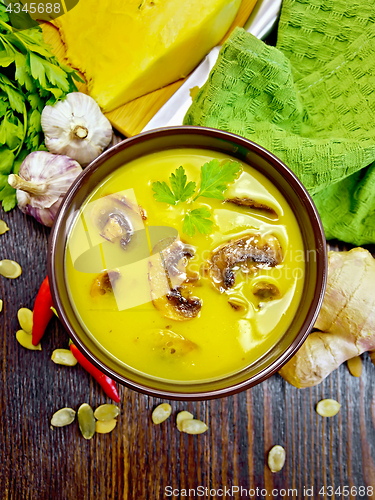 Image of Soup-puree pumpkin with champignons on board top