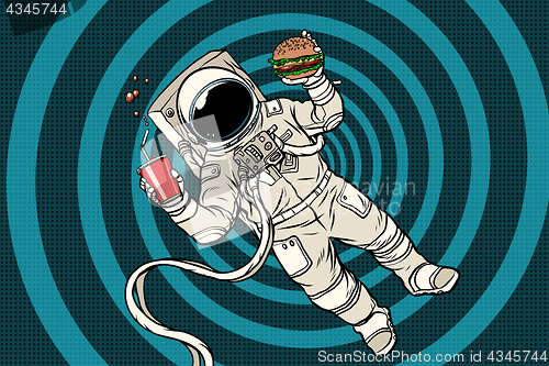 Image of Astronaut in zero gravity with fast food