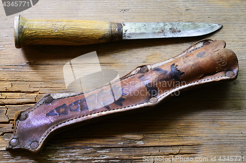 Image of traditional Finnish knife puukko and sheath