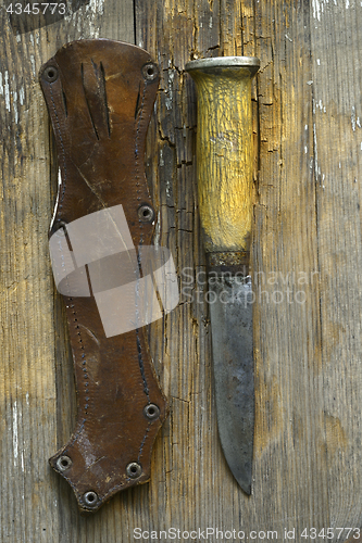 Image of traditional Finnish knife puukko and sheath