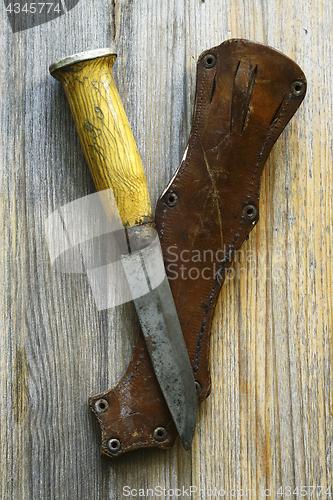 Image of traditional Finnish knife puukko and sheath