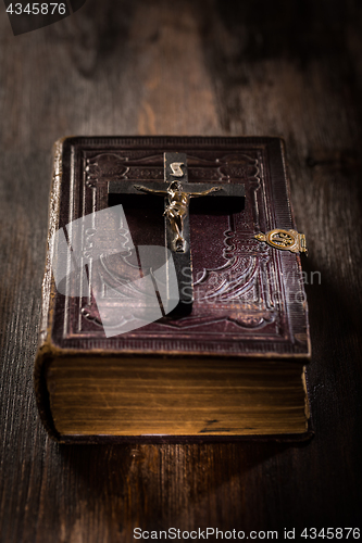 Image of Holy bible with wooden cross