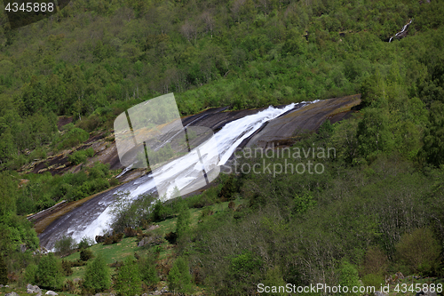 Image of The snow melting creates streams along the mountainside west of 