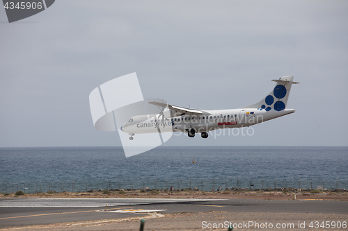 Image of ARECIFE, SPAIN - APRIL, 15 2017: ATR 72 of CANARYFLY.es landing 