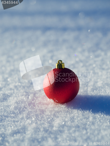 Image of christmas balls decoration in snow