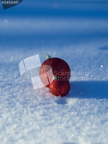 Image of christmas balls decoration in snow