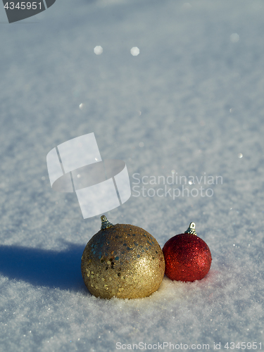 Image of christmas balls decoration in snow