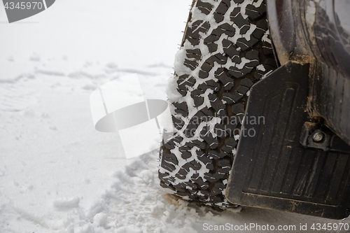 Image of Car tyre in snow