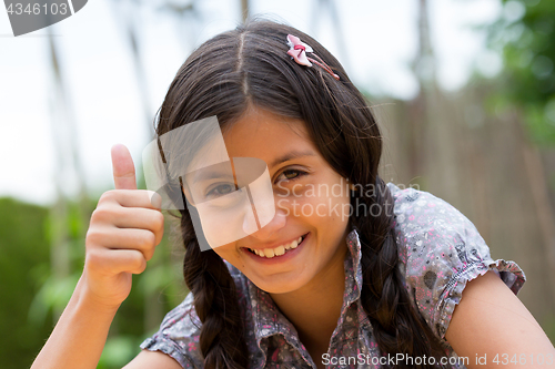 Image of Girl with thumbs up