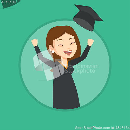 Image of Graduate throwing up graduation hat.