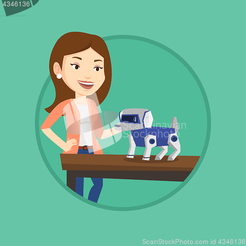 Image of Happy young woman playing with robotic dog.