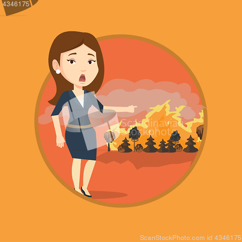 Image of Woman standing on background of wildfire.