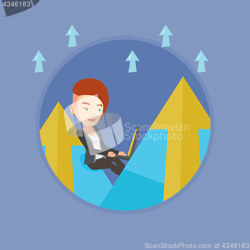 Image of Business woman working on laptop in the mountains.