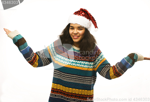 Image of cute young real african hipster girl in santas red hat isolated 