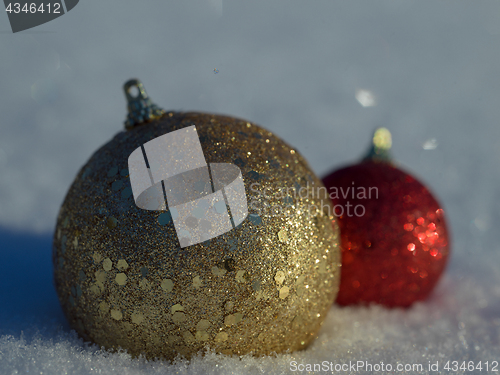 Image of christmas balls decoration in snow