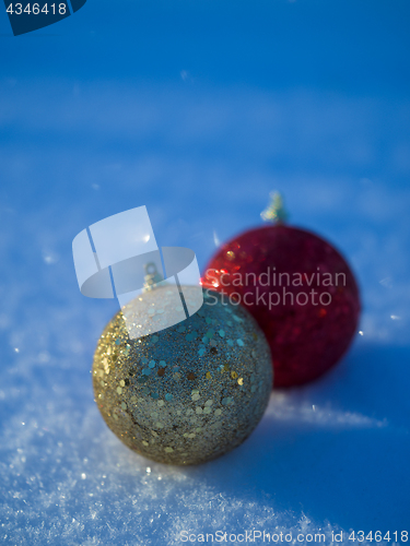 Image of christmas balls decoration in snow