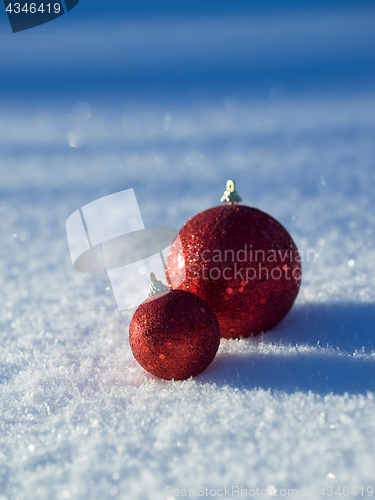 Image of christmas balls decoration in snow