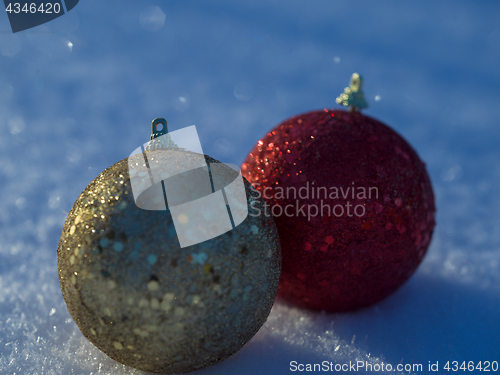 Image of christmas balls decoration in snow